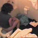 A woman is video recorded by an overhead SpyCam as she poops into a toilet. There is no audio, but we can see the shit coming out of her ass and falling into the water below. We also get to watch her wipe her ass afterwards.